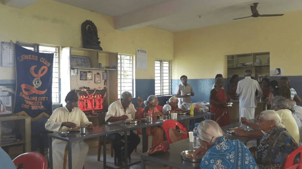 Inmates having lunch at Asha Deep